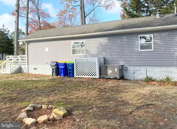 a front view of a house with garage