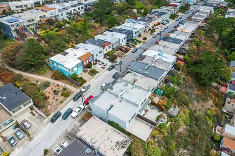 an aerial view of a city with lots of residential buildings