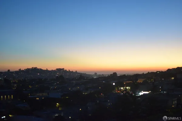 a view of city and mountain