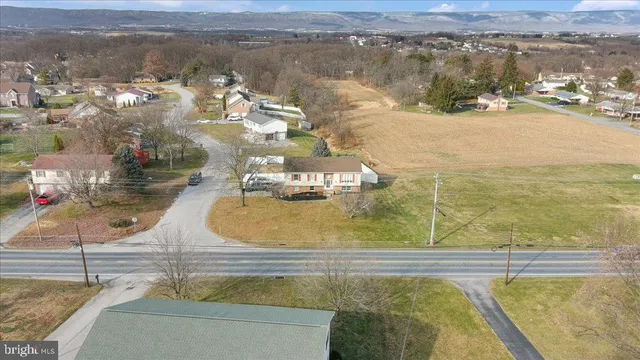 a view of swimming pool with a yard