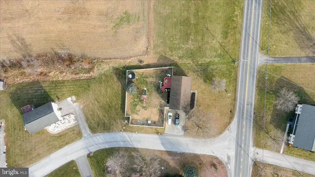 a view of a swimming pool and an outdoor seating