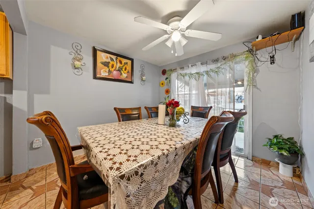 a view of a dining room and livingroom with furniture