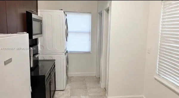 a close view of a refrigerator and washer