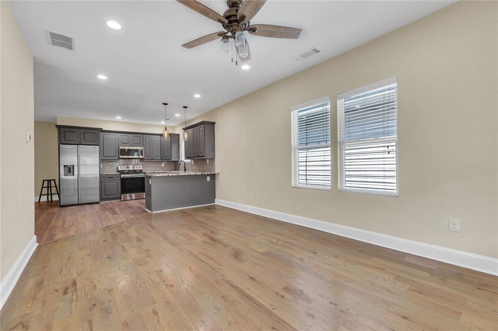 998 Mayson Turner Road Northwest, Unit A Atlanta, GA 30314 - Photo 5 of 26 a view of kitchen and windows