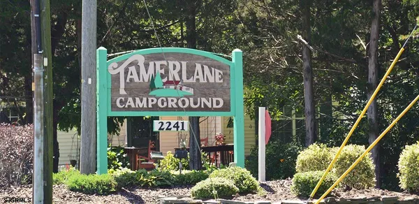 a view of a door with sign board