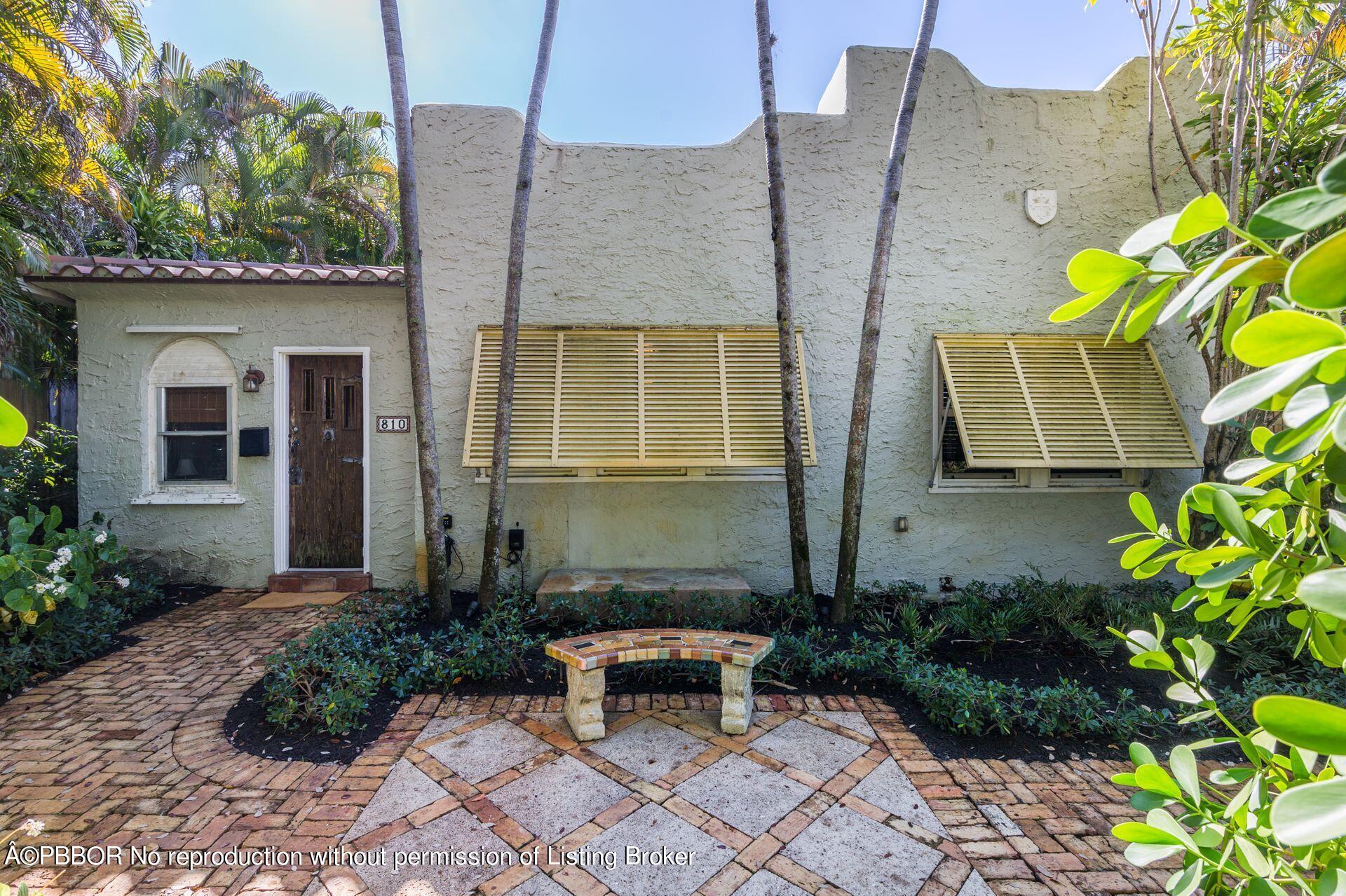 810 Avon Road West Palm Beach, FL 33401 - Photo 2 of 23 a front view of a house
