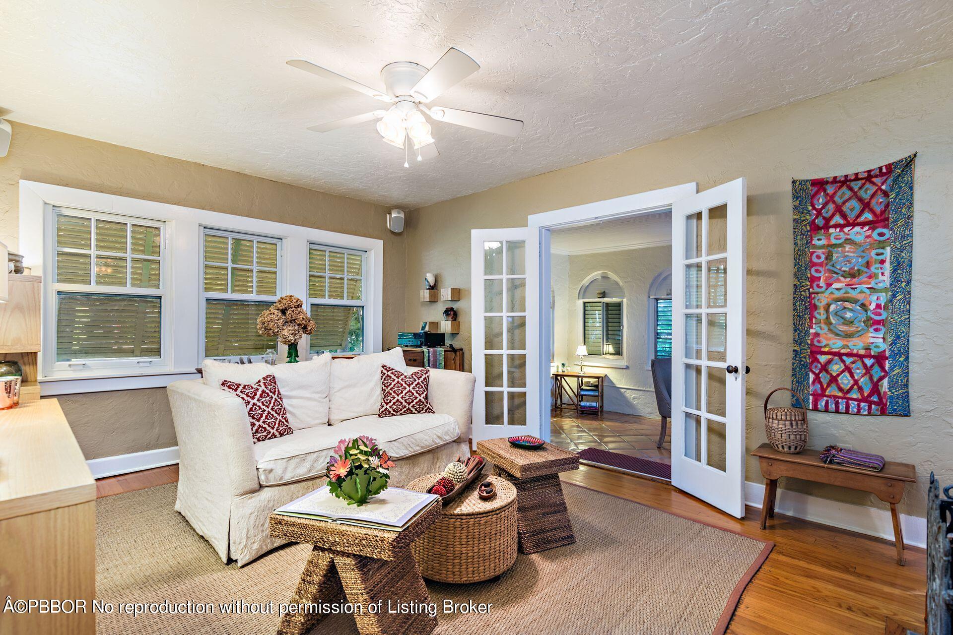 810 Avon Road West Palm Beach, FL 33401 - Photo 4 of 23 a living room with furniture and a large window