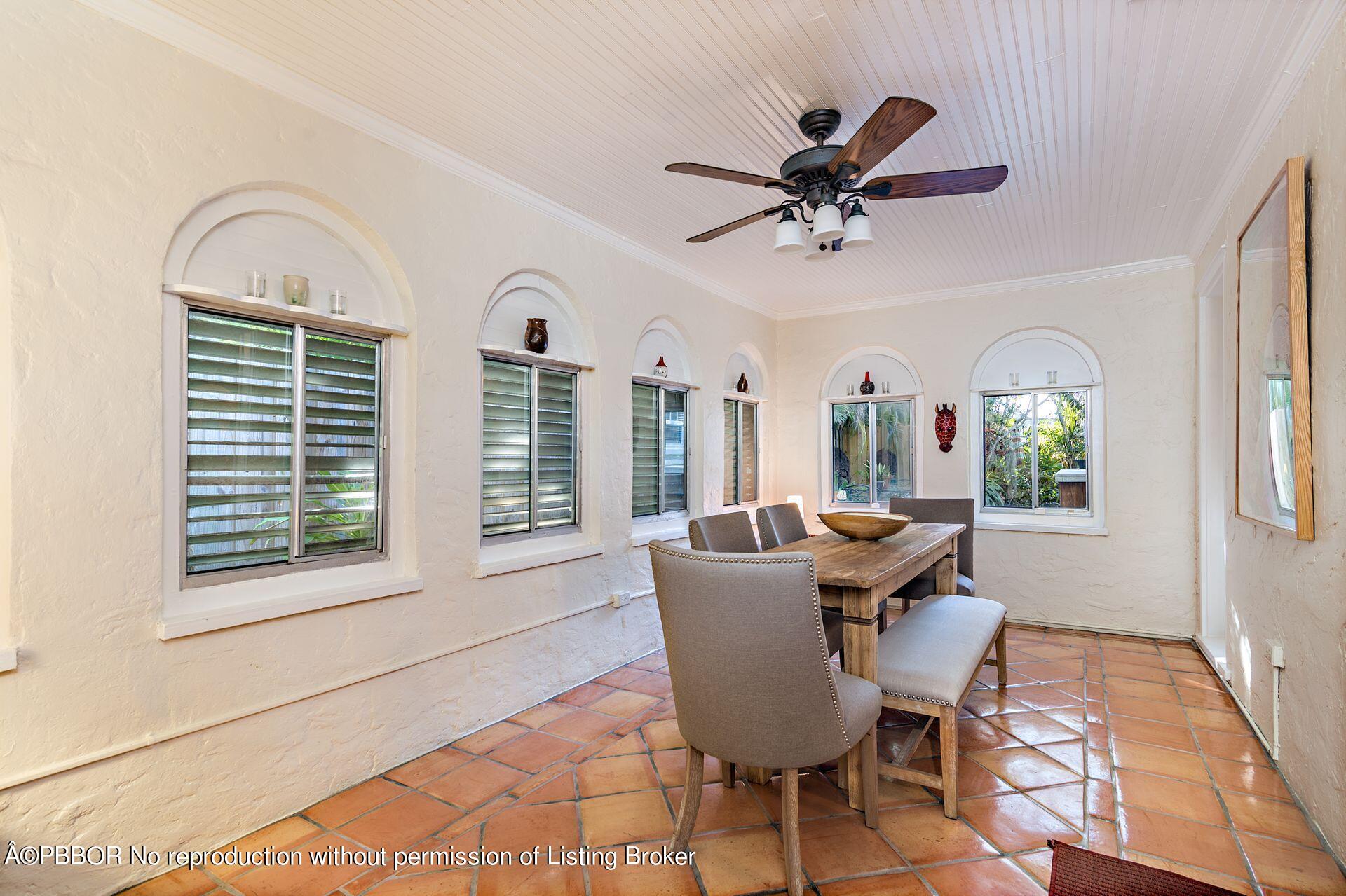 810 Avon Road West Palm Beach, FL 33401 - Photo 7 of 23 a view of a dining room with furniture window and outside view
