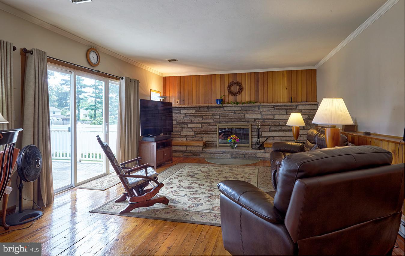 21 Georgetown Road Bordentown, NJ 08505 - Photo 13 of 38 Family Room with Fireplace plus sliders to Rear