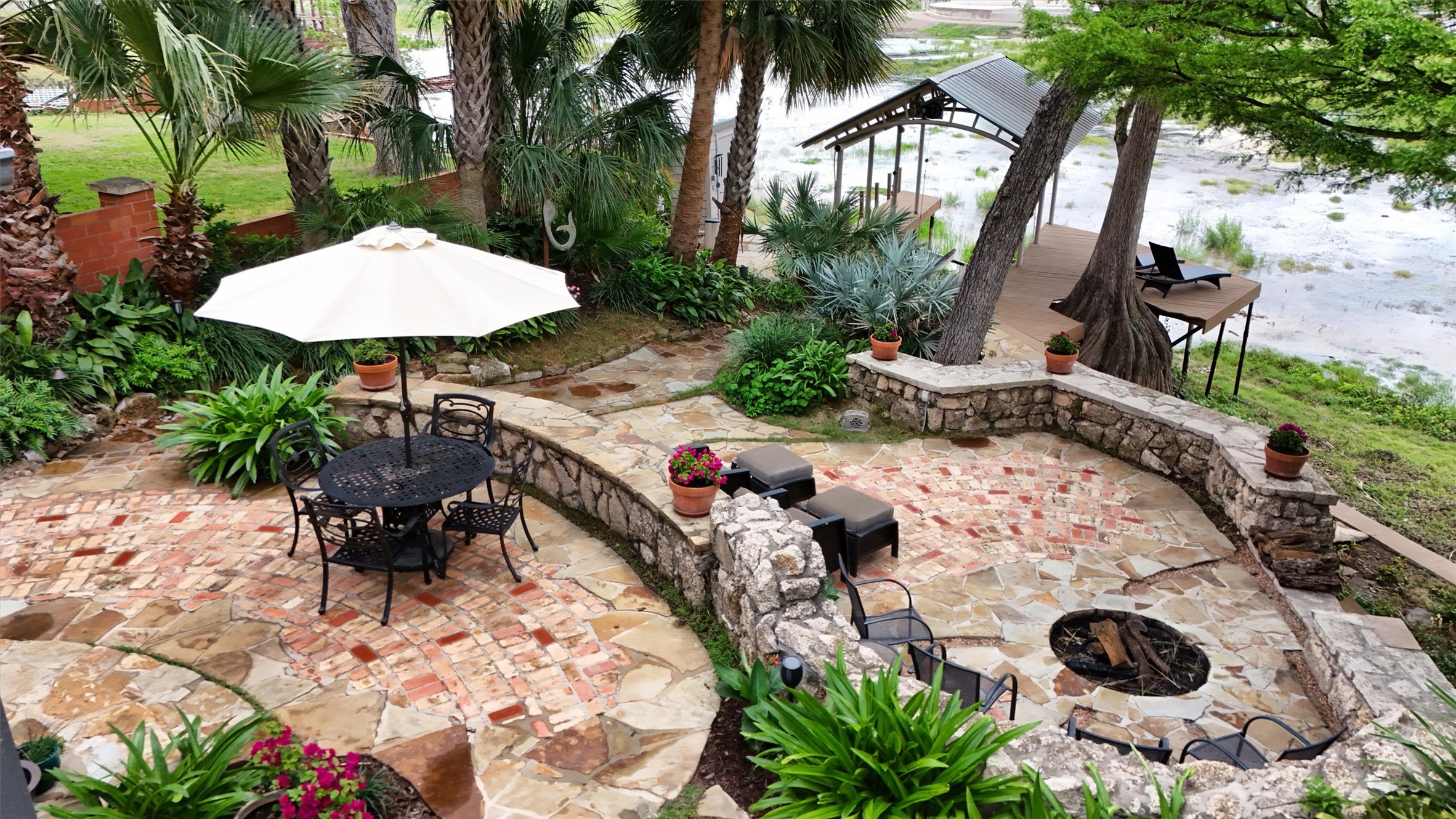 1807 Terminal Loop Road McQueeney, TX 78123 - Photo 14 of 32 View of patio / terrace featuring outdoor dining space and a fire pit