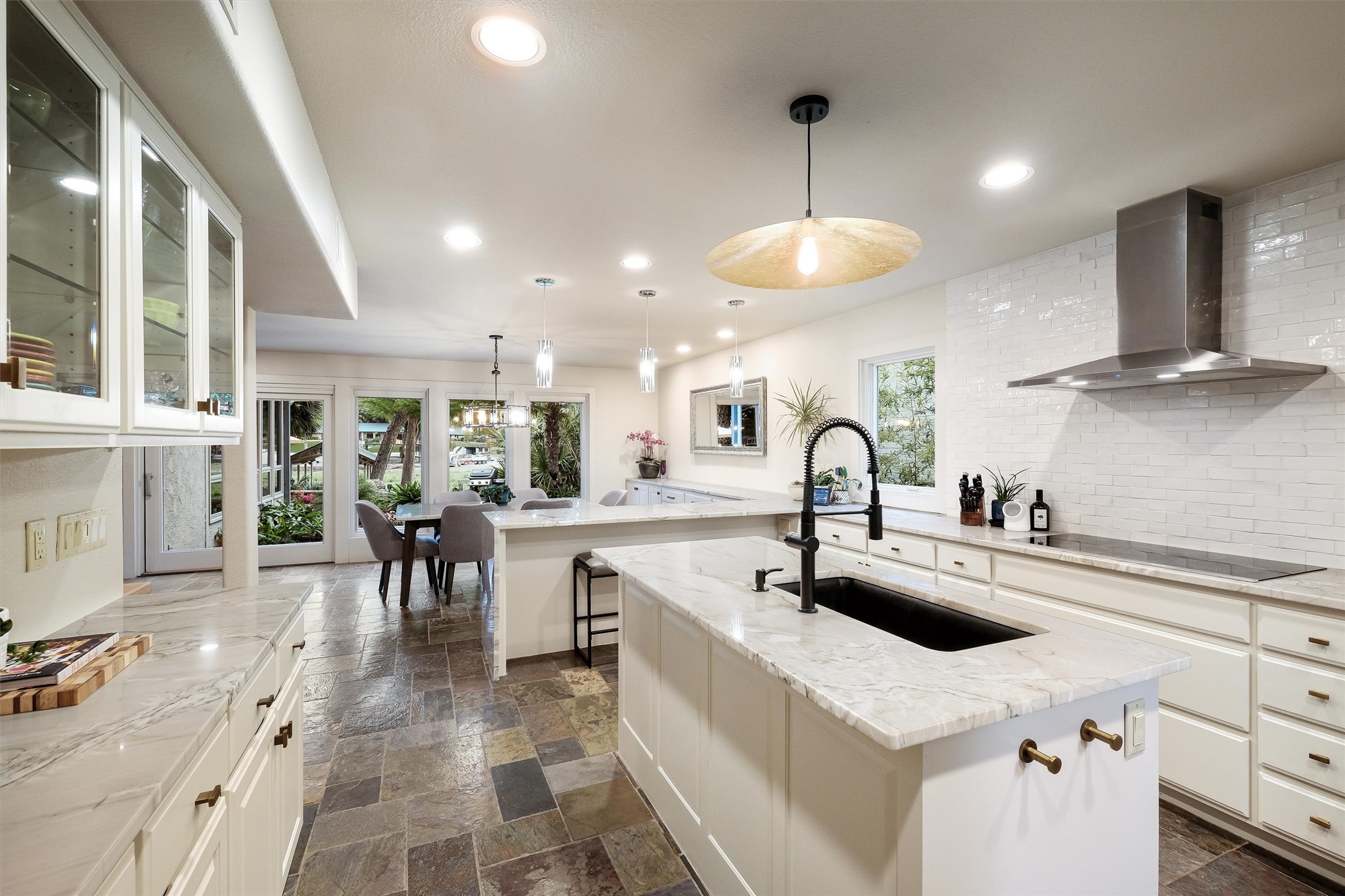 1807 Terminal Loop Road McQueeney, TX 78123 - Photo 2 of 32 Completely updated kitchen with quartzite countertops and new appliances.