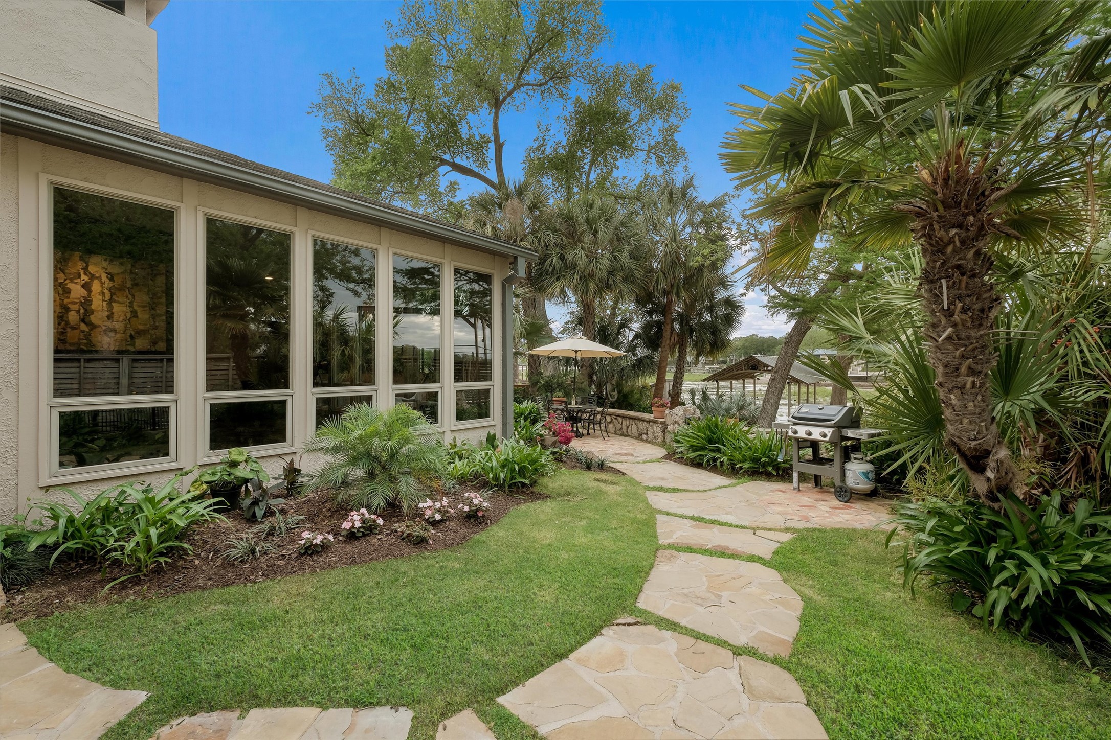 1807 Terminal Loop Road McQueeney, TX 78123 - Photo 21 of 32 Flag stone walkway to back terraces