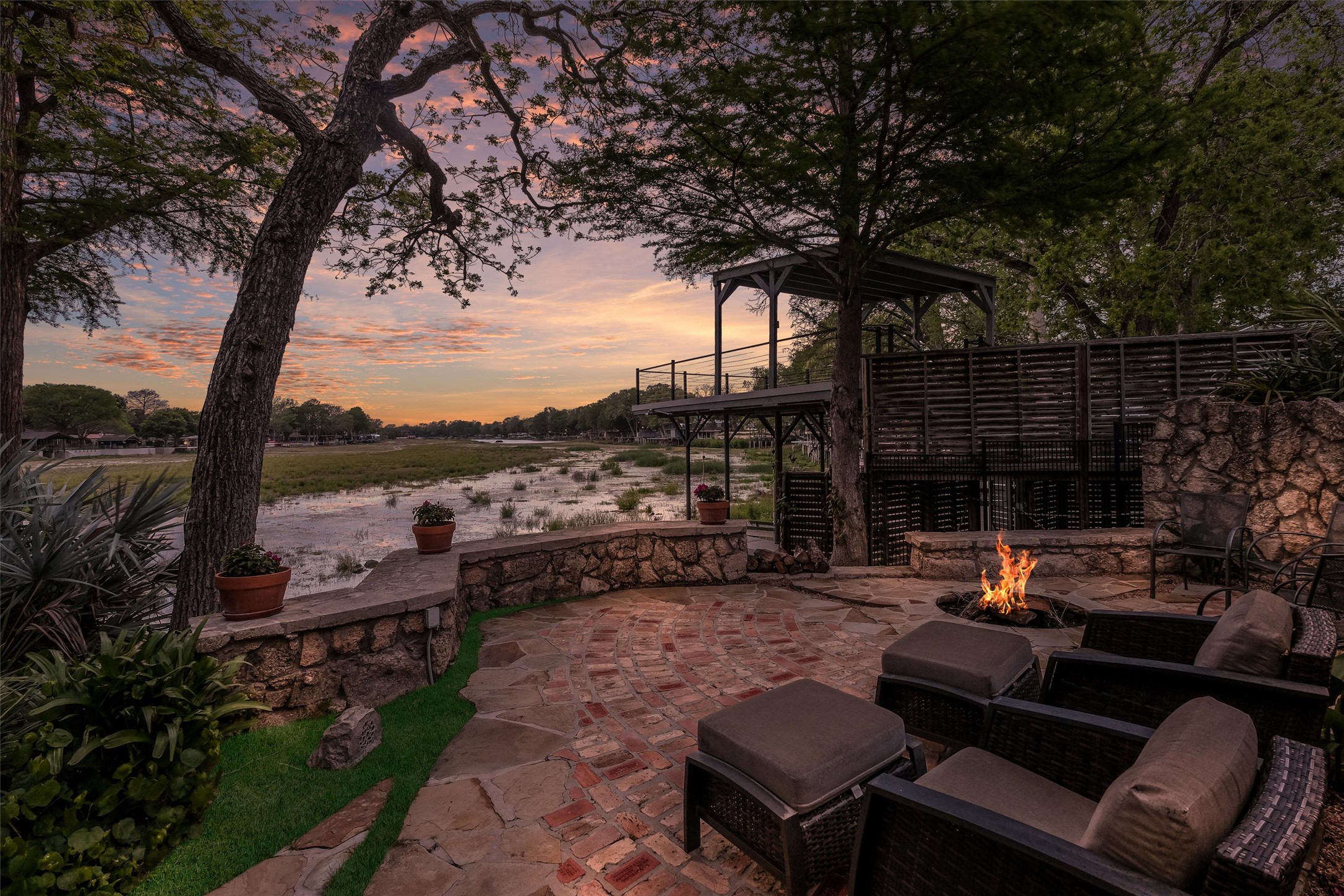 1807 Terminal Loop Road McQueeney, TX 78123 - Photo 26 of 32 Patio terrace at dusk featuring a fire pit and a patio area