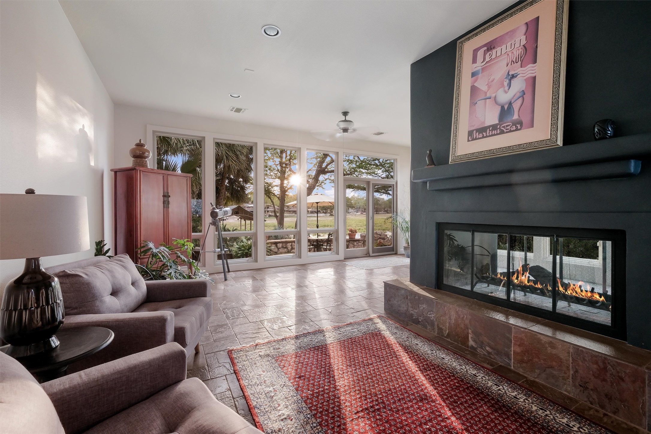 1807 Terminal Loop Road McQueeney, TX 78123 - Photo 5 of 32 Living area with see through fireplace and lake view.