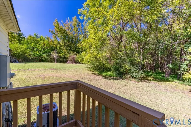 a view of a balcony with an outdoor space