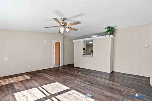 a view of an empty room and window