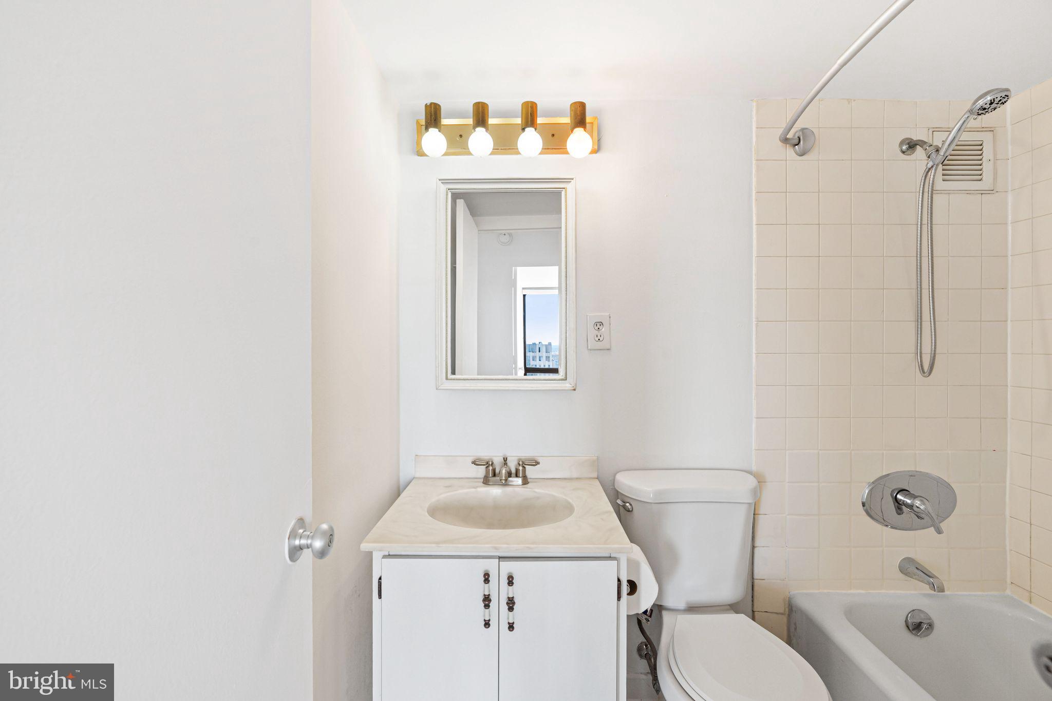 200 Locust Street, Unit 27FN Philadelphia, PA 19106 - Photo 12 of 48 a bathroom with a sink toilet and shower