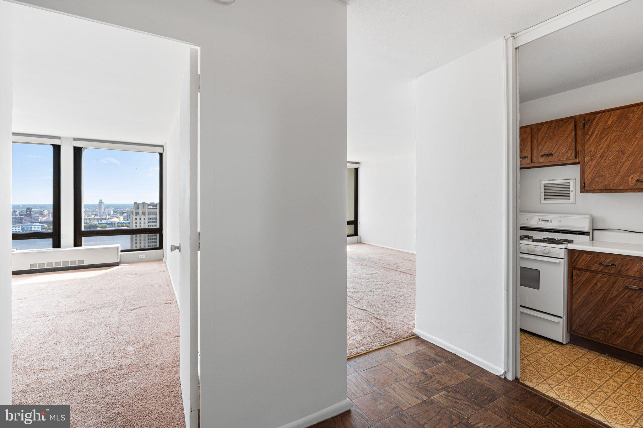 200 Locust Street, Unit 27FN Philadelphia, PA 19106 - Photo 13 of 48 a view of a kitchen cabinets and a stove top oven