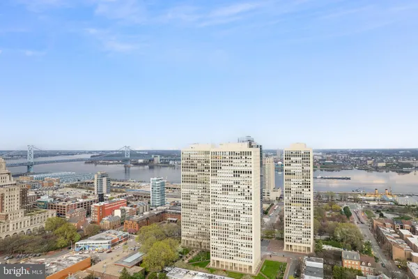 a view of a city with tall buildings