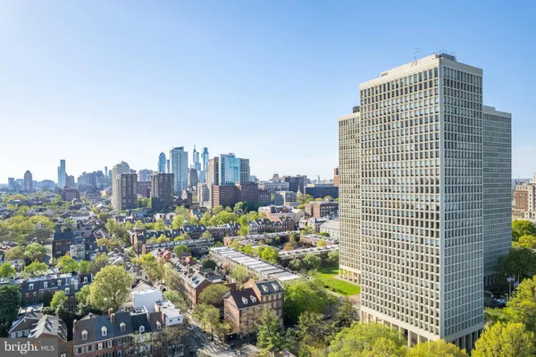 a view of a city with tall buildings
