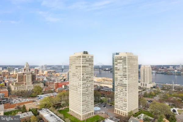 a view of a city with tall buildings