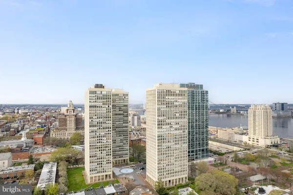 a view of a city with tall buildings