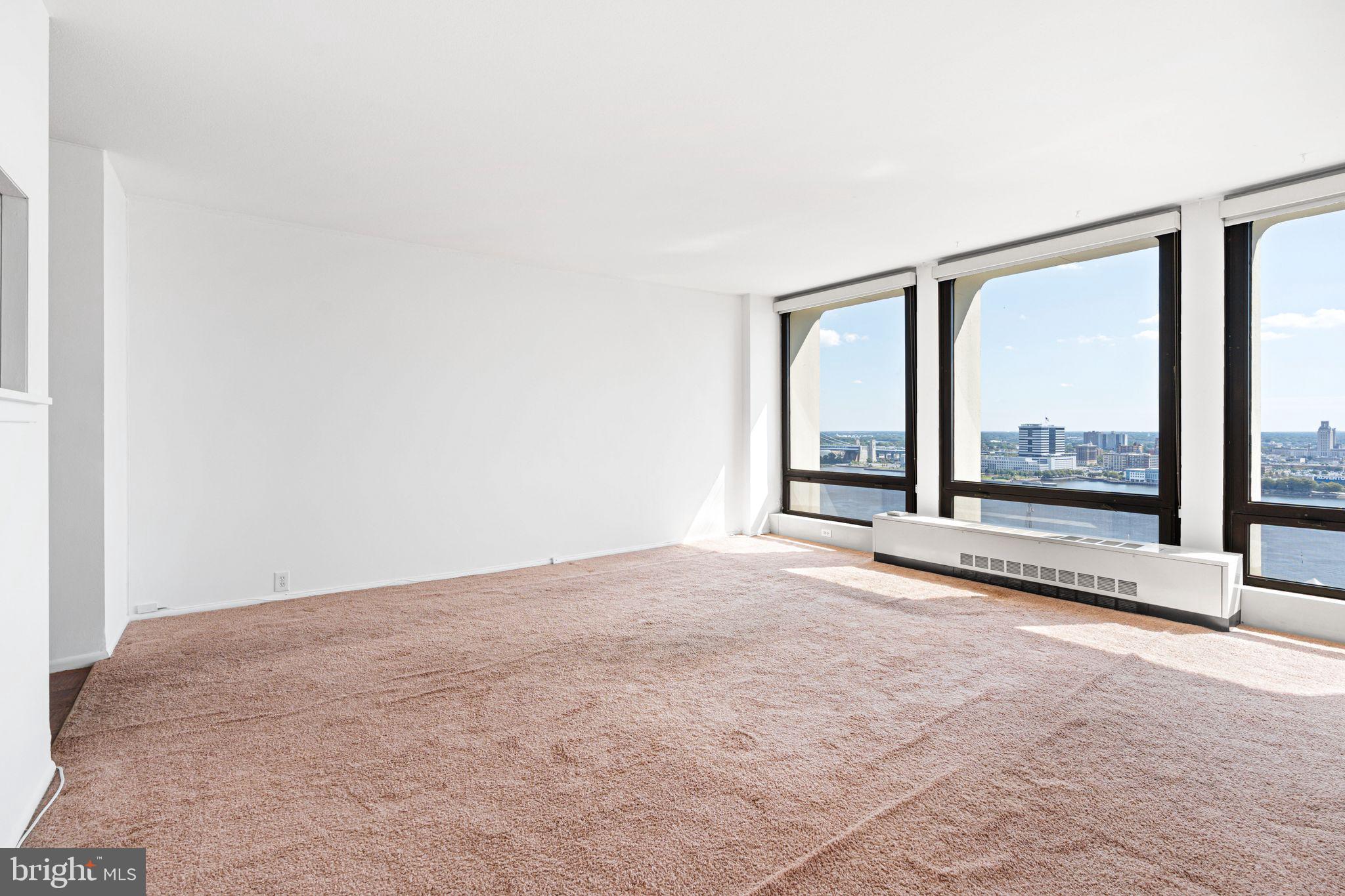 200 Locust Street, Unit 27FN Philadelphia, PA 19106 - Photo 10 of 48 a view of an empty room with a window