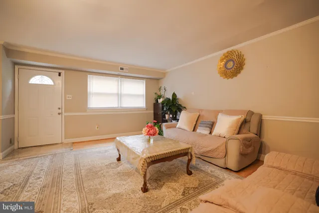 a living room with furniture and window