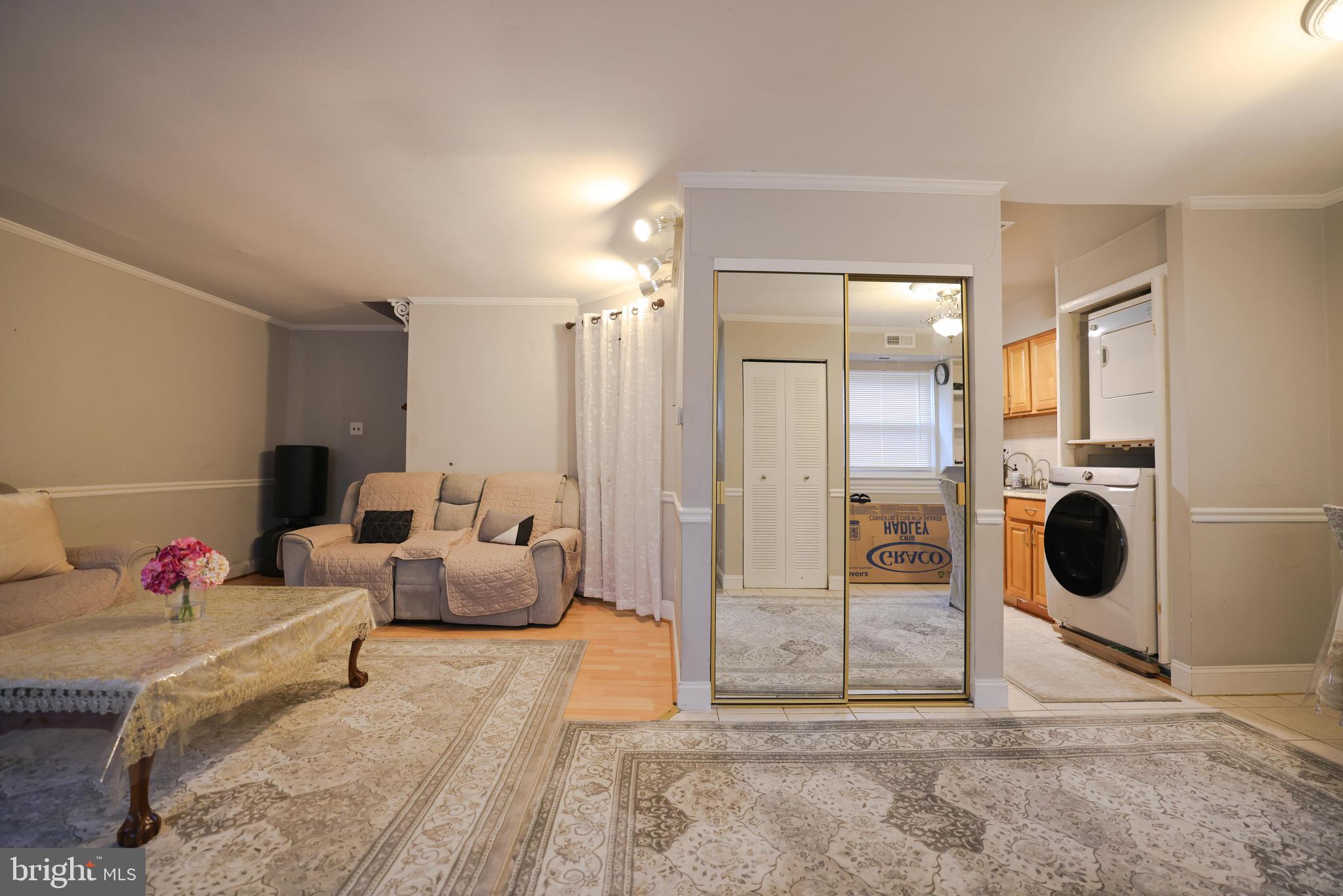 611 Edison Avenue, Unit C Philadelphia, PA 19116 - Photo 24 of 30 a living room with furniture and a view of living room