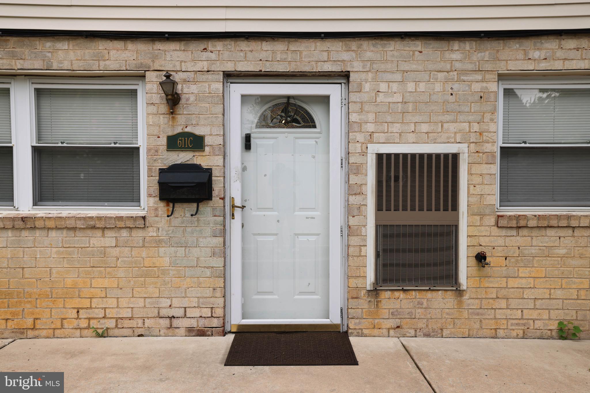 611 Edison Avenue, Unit C Philadelphia, PA 19116 - Photo 28 of 30 a front view of a house with a door