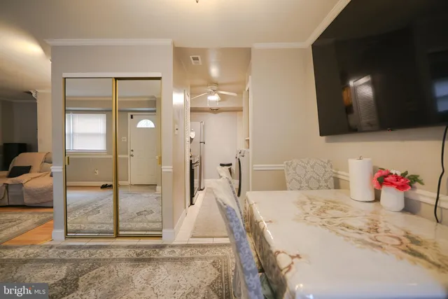 a bathroom with a tub sink and shower