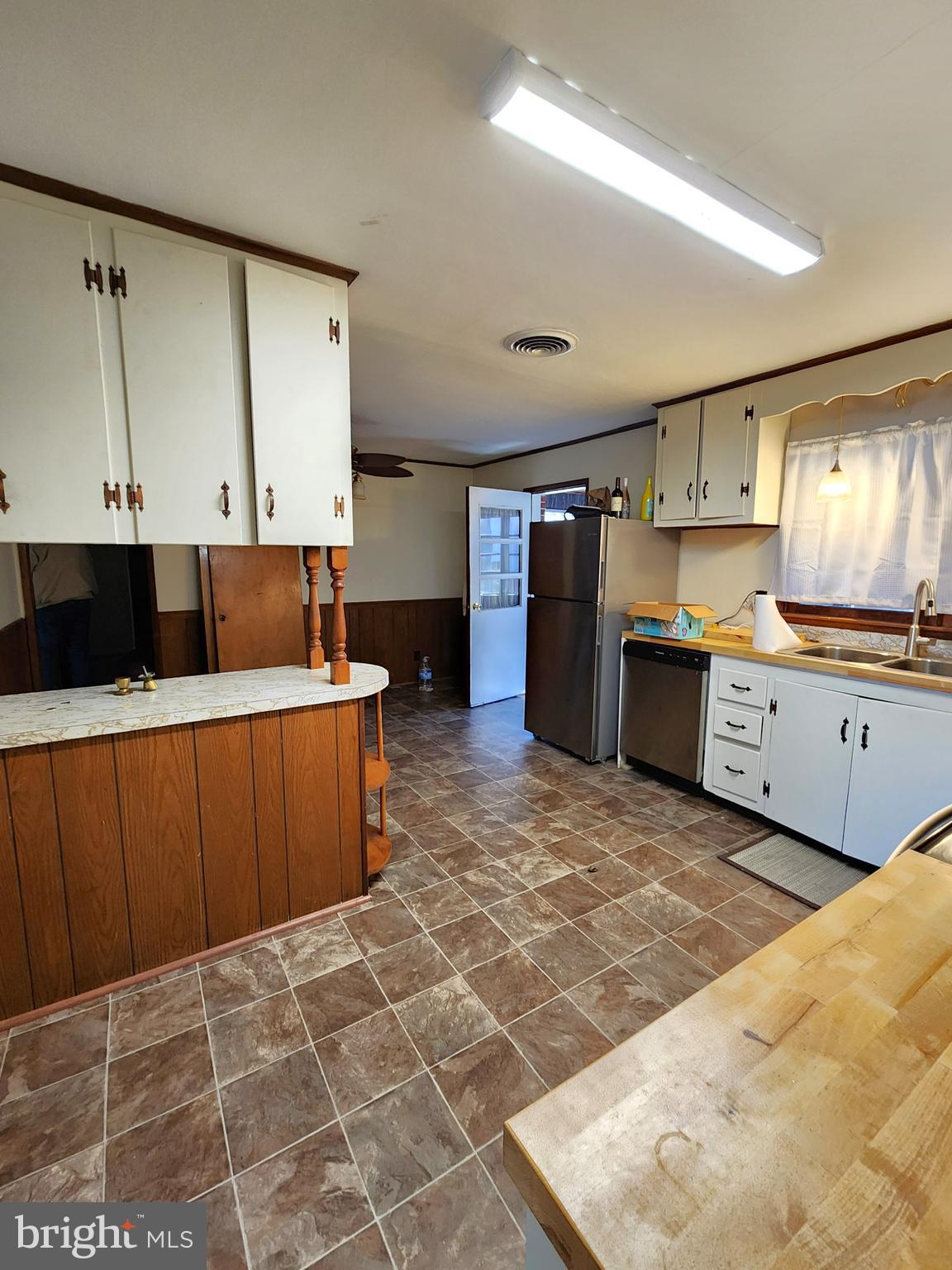 8754 Concord Road Seaford, DE 19973 - Photo 6 of 21 a kitchen with a cabinets and window