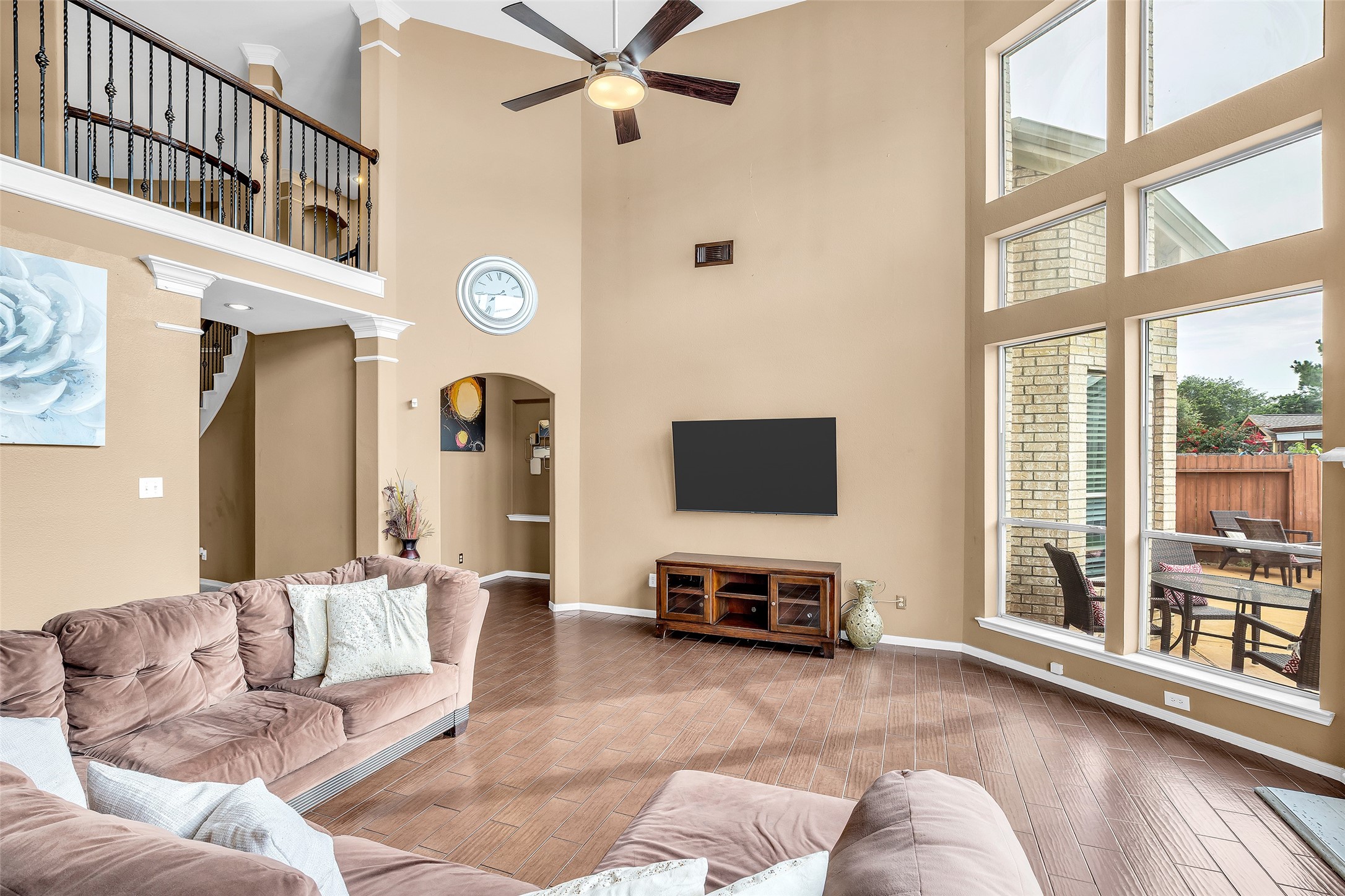 611 River Delta Lane Rosenberg, TX 77469 - Photo 18 of 39 a living room with furniture and a flat screen tv
