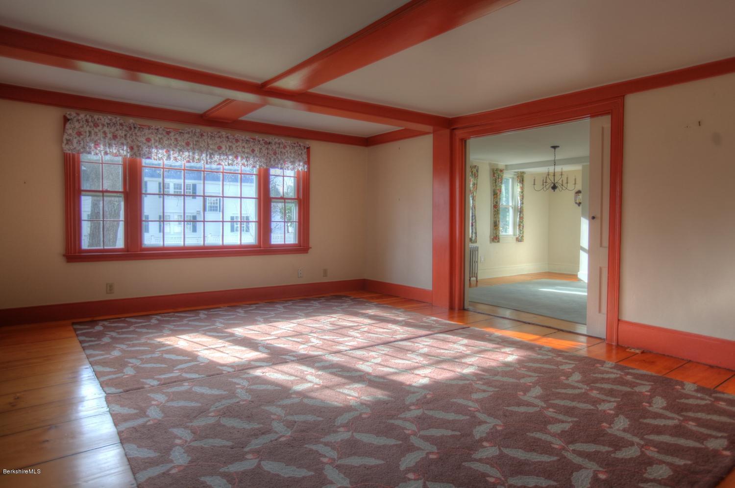 1226 State Road Richmond, MA 01254 - Photo 14 of 50 a view of an empty room with wooden floor and a window