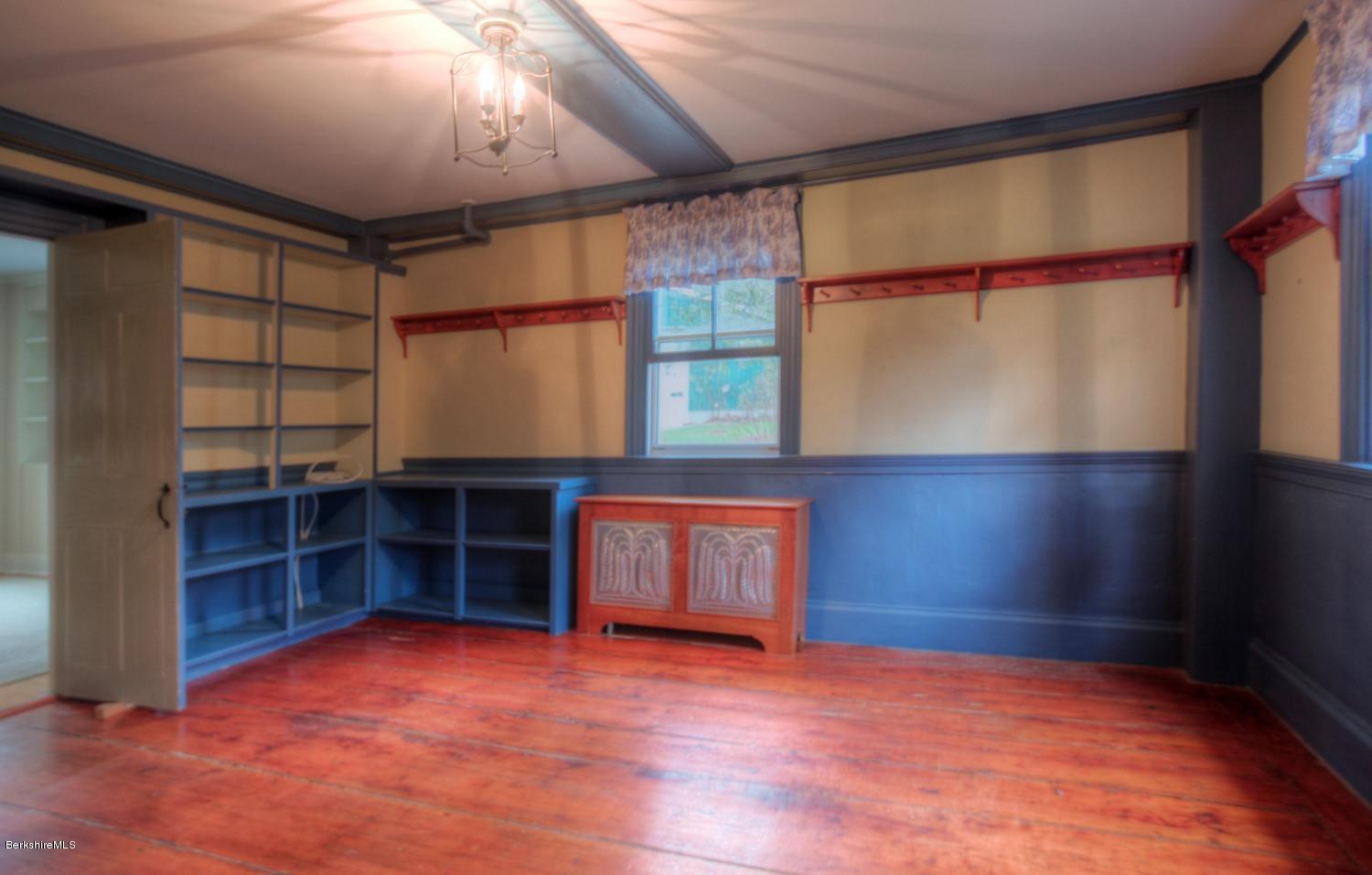 1226 State Road Richmond, MA 01254 - Photo 20 of 50 an empty room with furniture and a window
