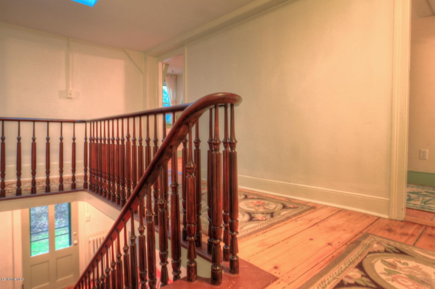 1226 State Road Richmond, MA 01254 - Photo 23 of 50 a view of staircase with railing and a rug