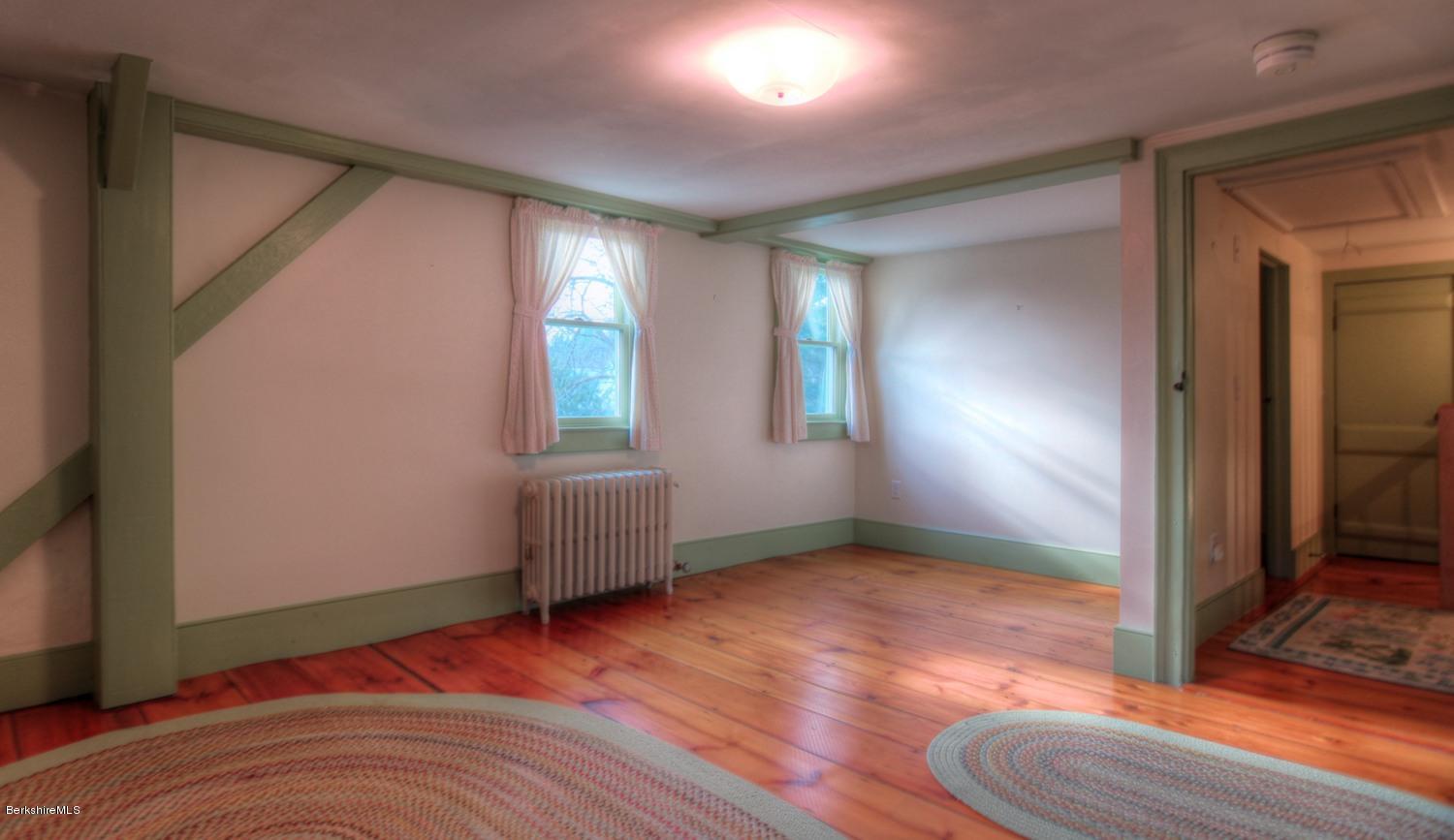 1226 State Road Richmond, MA 01254 - Photo 24 of 50 an empty room with windows and closet