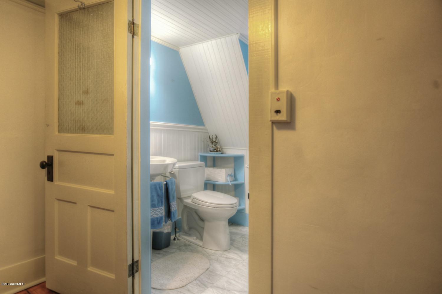 1226 State Road Richmond, MA 01254 - Photo 25 of 50 a bathroom with a toilet and a shower