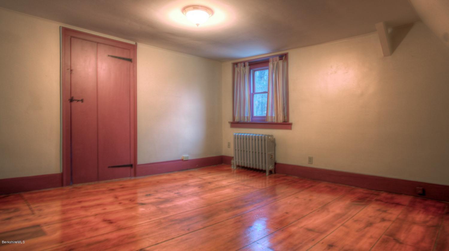 1226 State Road Richmond, MA 01254 - Photo 28 of 50 an empty room with wooden floor and windows