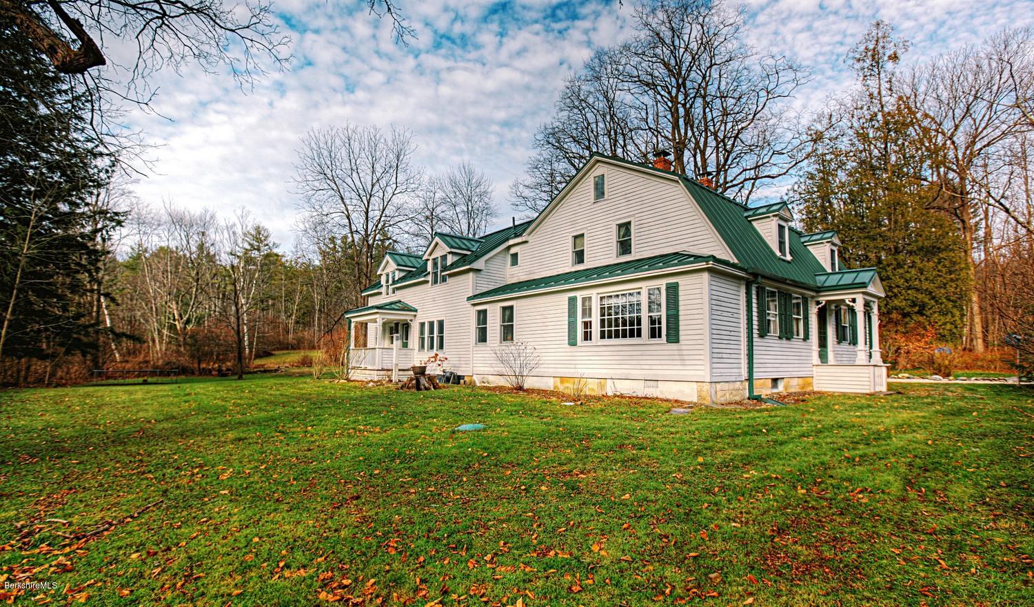 1226 State Road Richmond, MA 01254 - Photo 4 of 50 a front view of a house with a yard