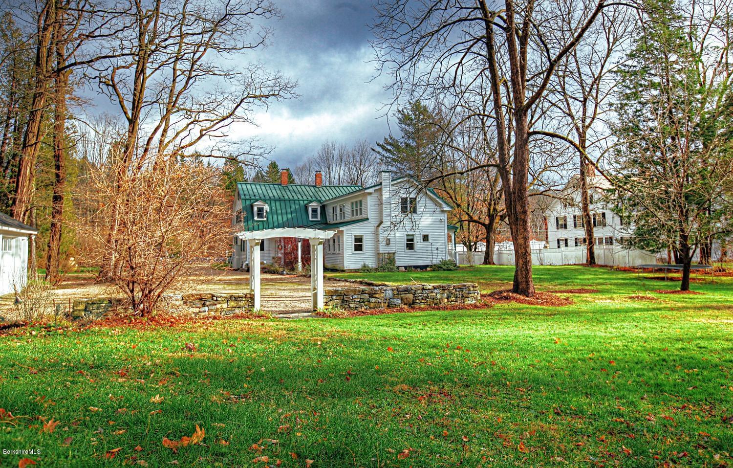 1226 State Road Richmond, MA 01254 - Photo 5 of 50 a view of a house with a big yard and large trees
