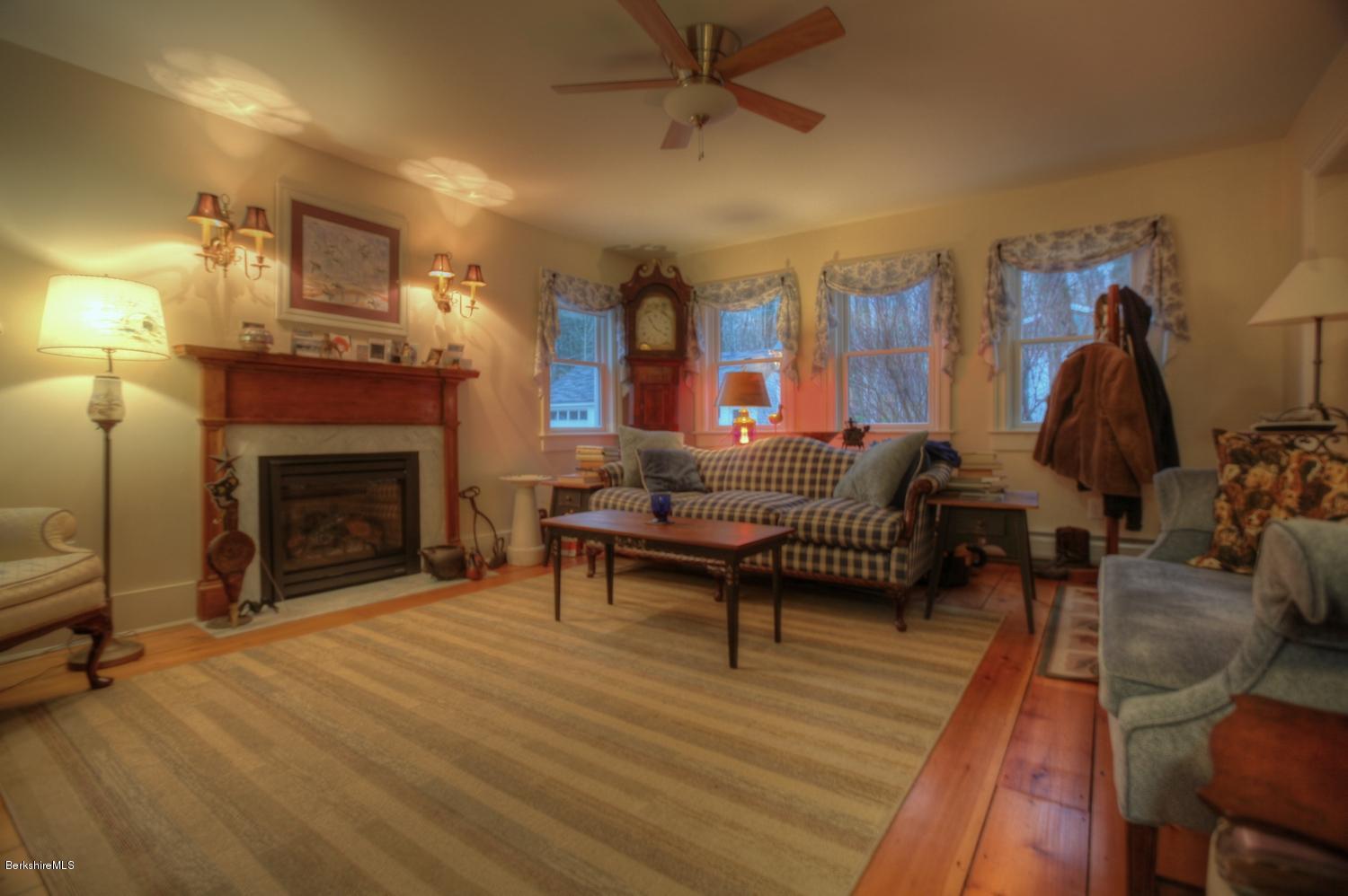 1226 State Road Richmond, MA 01254 - Photo 42 of 50 a living room with furniture and a fireplace