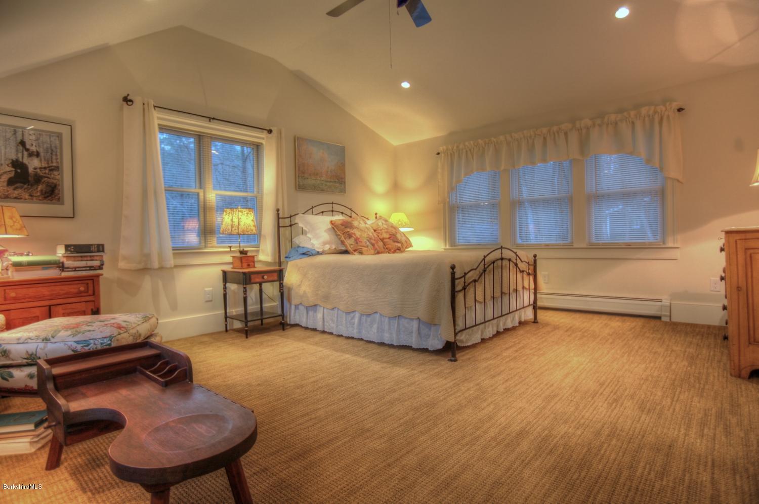 1226 State Road Richmond, MA 01254 - Photo 44 of 50 a living room with a bed furniture and a window