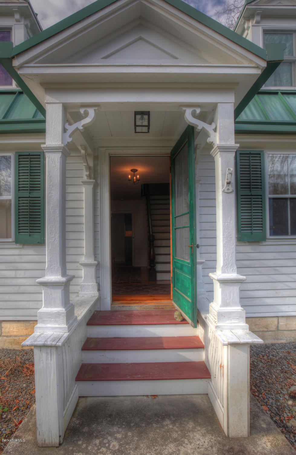 1226 State Road Richmond, MA 01254 - Photo 9 of 50 a front view of a house with a porch
