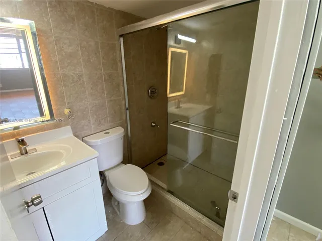 a view of balcony with furniture