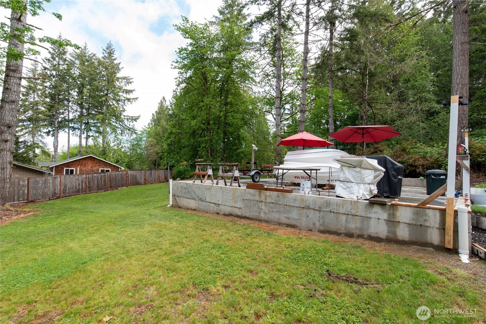 151 East Hillside Drive Belfair, WA 98528 - Photo 13 of 24 a view of a house with a yard