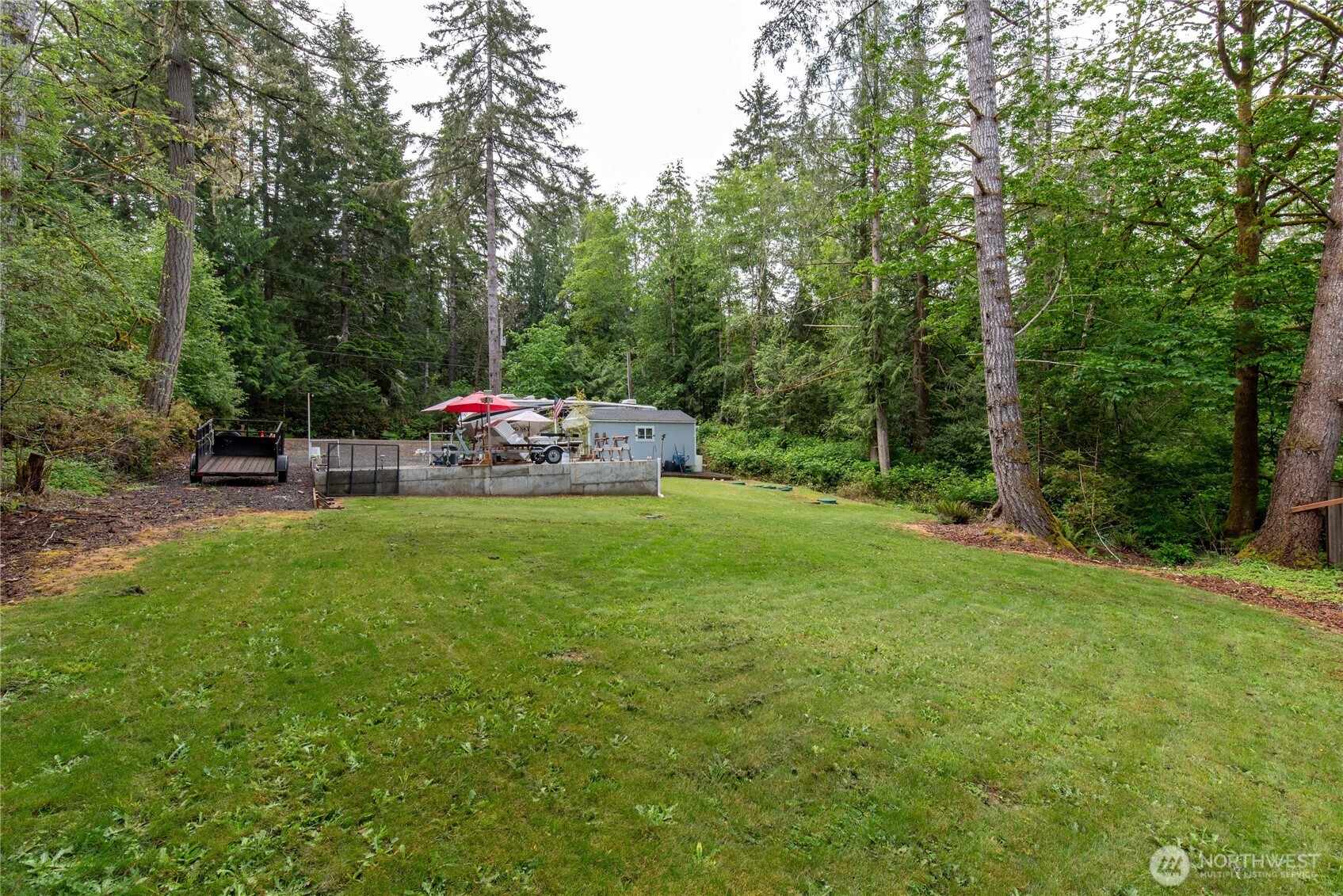 151 East Hillside Drive Belfair, WA 98528 - Photo 16 of 24 a view of a park with large trees