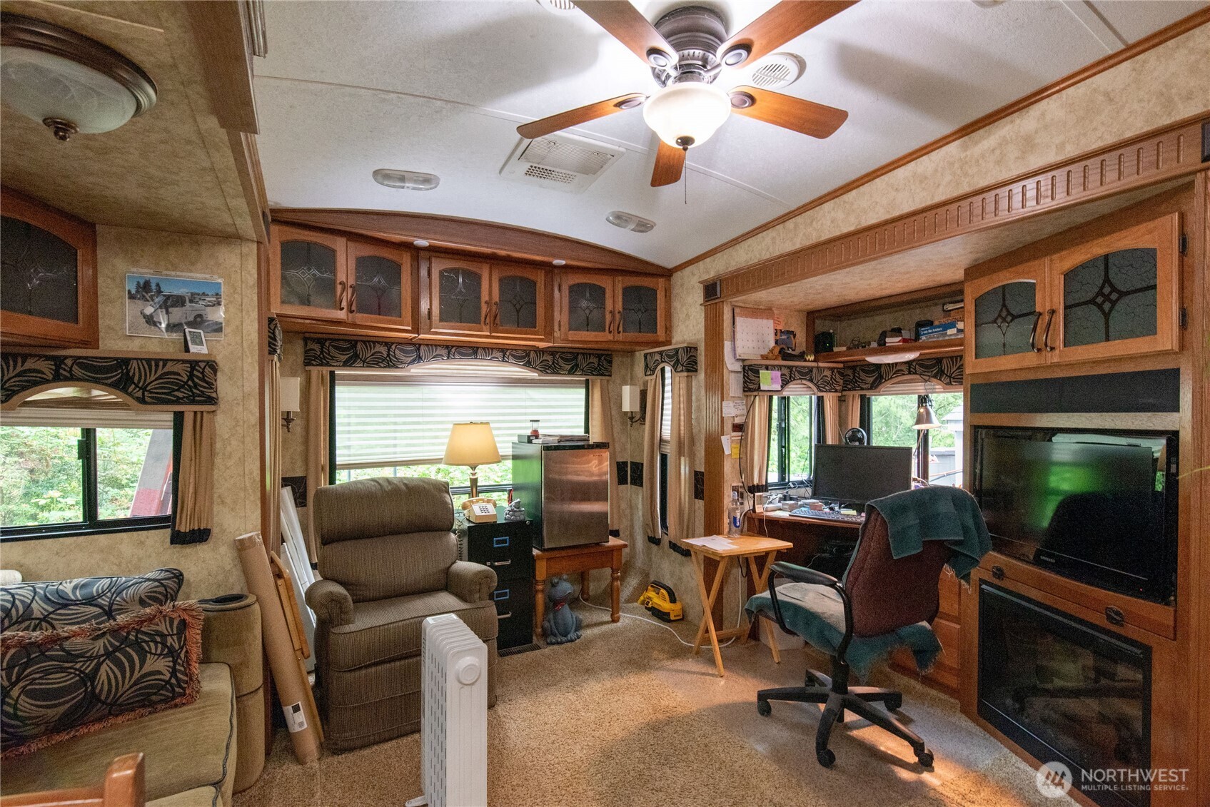 151 East Hillside Drive Belfair, WA 98528 - Photo 23 of 24 a view of a livingroom with workspace and a window