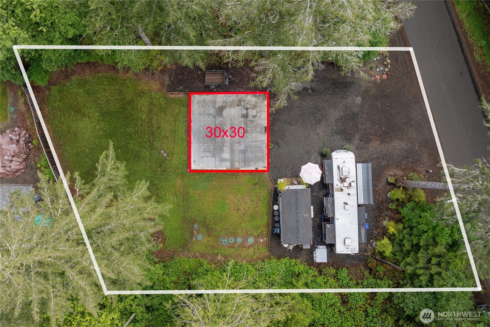 151 East Hillside Drive Belfair, WA 98528 - Photo 5 of 24 a front view of a house with a yard