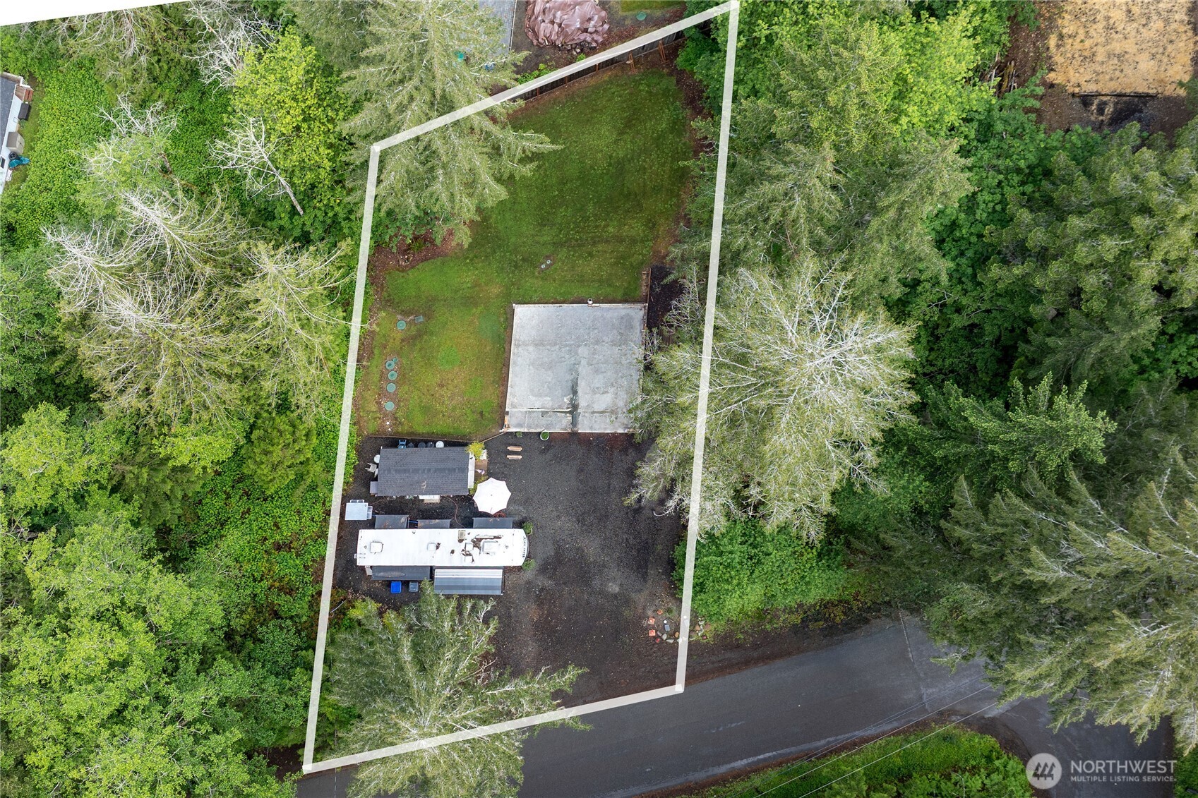 151 East Hillside Drive Belfair, WA 98528 - Photo 7 of 24 a house view with a garden
